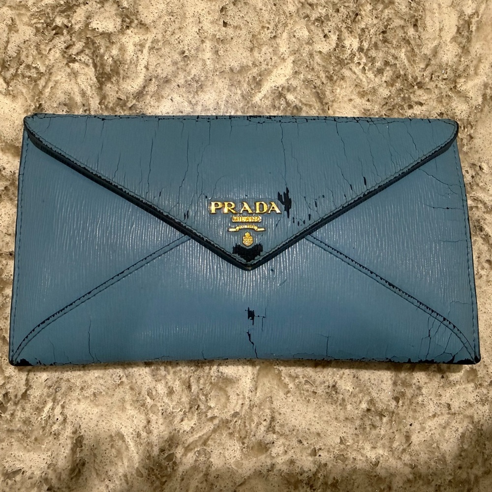 Authentic Prada Vitello Move Envelope Wallet in worn condition